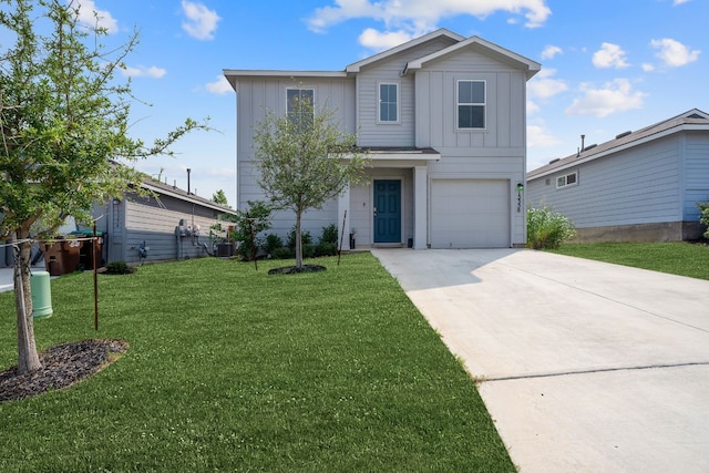 front of property with a garage and a front lawn