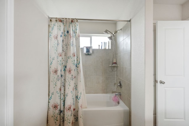 bathroom featuring shower / bath combo with shower curtain