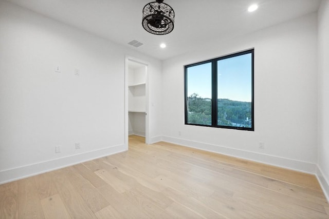 18116 Cedar Sage Ct, Lago Vista, TX 78645 - spare room with light wood-style flooring, baseboards, and recessed lighting