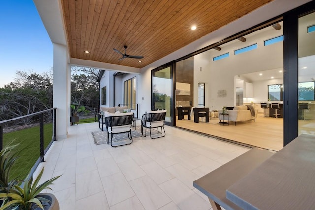 patio terrace at dusk with ceiling fan