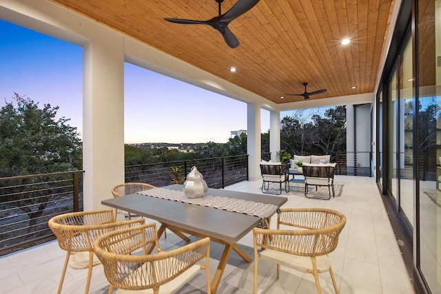 18116 Cedar Sage Ct, Lago Vista, TX 78645 - patio terrace at dusk with ceiling fan and a balcony