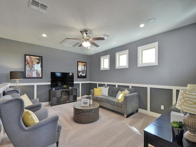 living room with carpet floors and ceiling fan