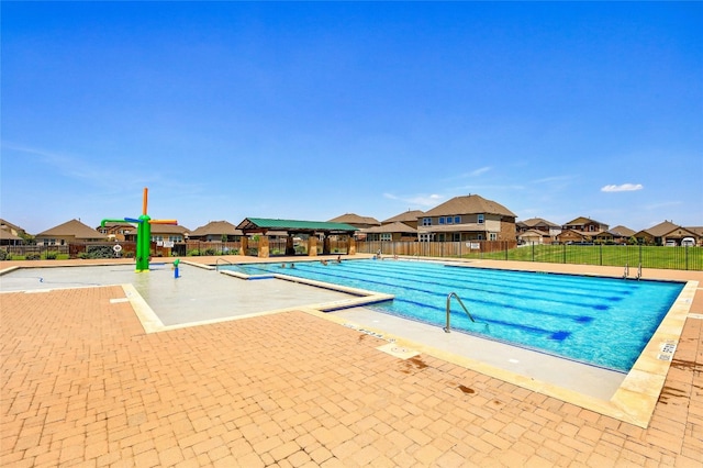 view of pool featuring a patio area