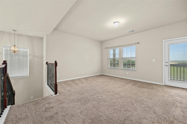 empty room with carpet floors