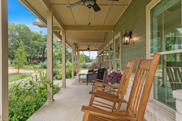 view of patio featuring ceiling fan and covered porch