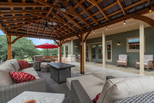 1451 Gatlin Creek Rd E, Driftwood, TX 78619 - view of patio / terrace with a gazebo, french doors, an outdoor living space with a fire pit, and ceiling fan