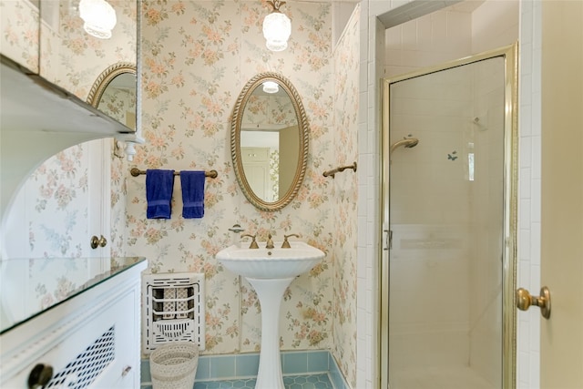 bathroom featuring tile patterned floors and an enclosed shower