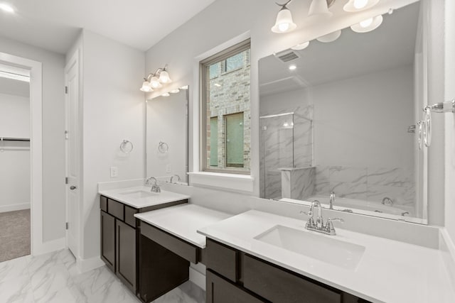 bathroom with vanity, a wealth of natural light, and shower with separate bathtub