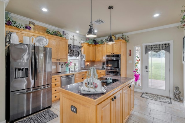 kitchen with tasteful backsplash, crown molding, a center island, and appliances with stainless steel finishes