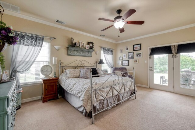 bedroom featuring access to exterior, ceiling fan, crown molding, and light colored carpet