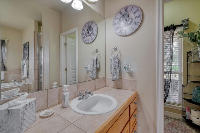 bathroom featuring plus walk in shower and vanity