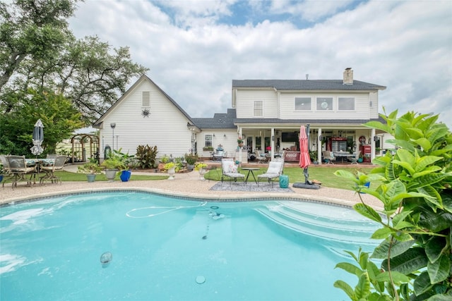 view of pool with a patio area