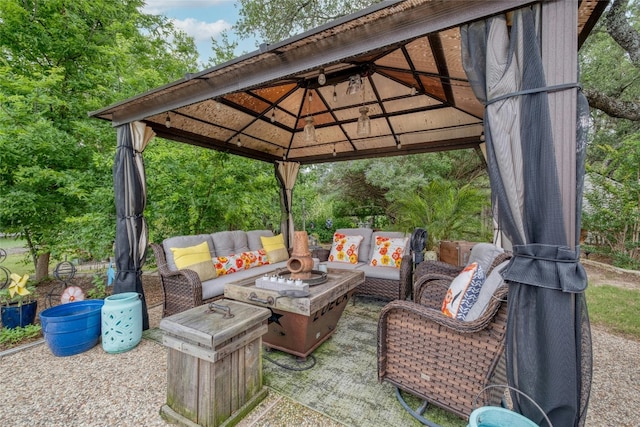 view of patio featuring a gazebo and outdoor lounge area