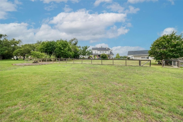 view of yard with a rural view