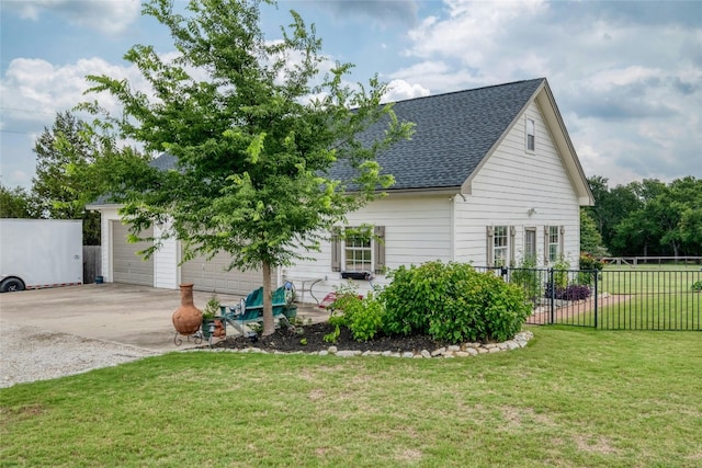 view of home's exterior featuring a yard and a garage