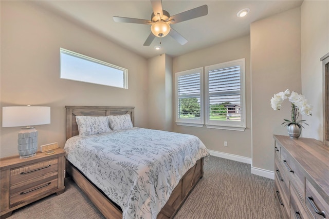 carpeted bedroom with ceiling fan