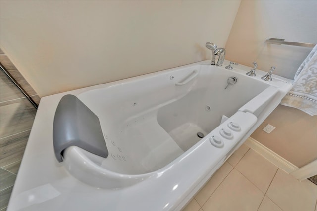 bathroom with tile flooring