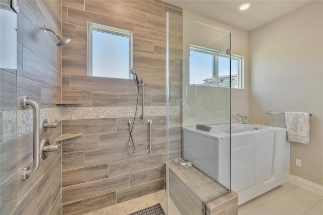 bathroom featuring an enclosed shower and tile floors