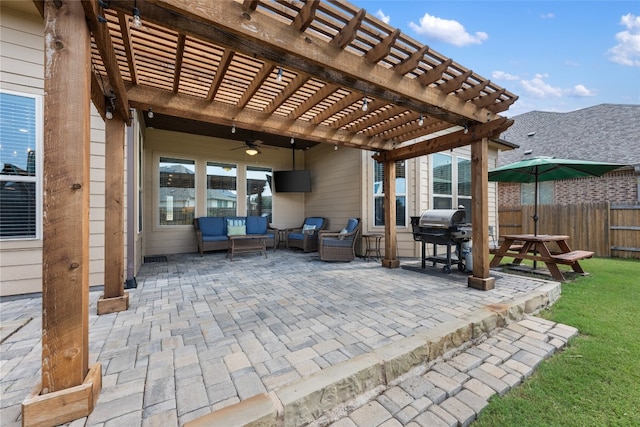 view of patio with an outdoor living space, a pergola, and a grill