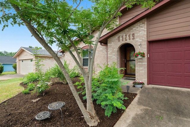 property entrance featuring a garage