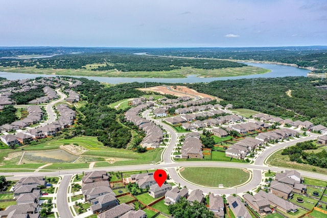 aerial view with a water view and a residential view