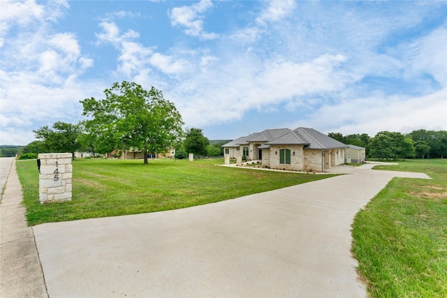 view of front of home with a front lawn