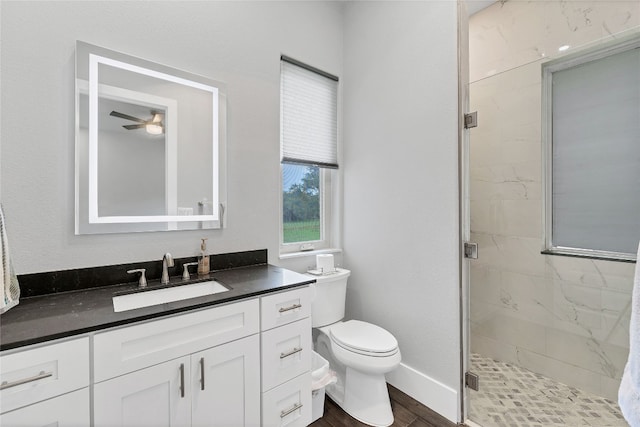 bathroom featuring vanity, toilet, an enclosed shower, and wood-type flooring