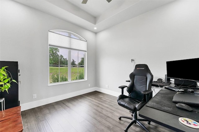 office space featuring baseboards, recessed lighting, ceiling fan, and wood finished floors