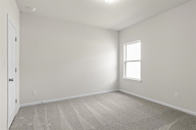 empty room with carpet floors