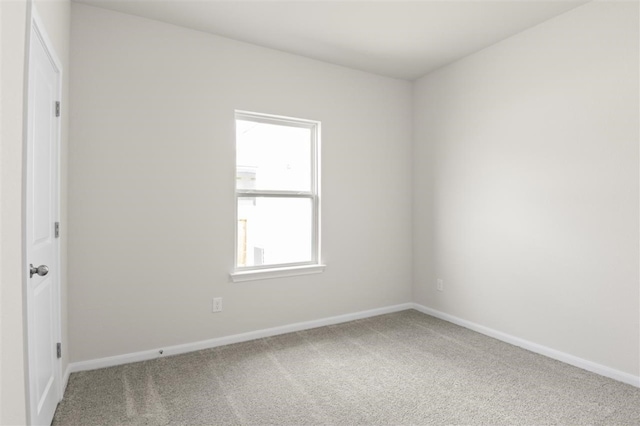 unfurnished room with carpet flooring