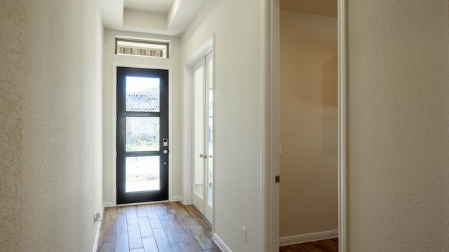 entrance foyer featuring hardwood / wood-style flooring