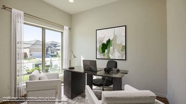 home office featuring hardwood / wood-style floors