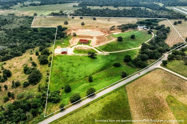 birds eye view of property featuring a rural view