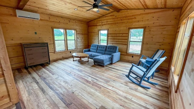 living area featuring wooden ceiling, lofted ceiling with beams, an AC wall unit, wooden walls, and light hardwood / wood-style floors