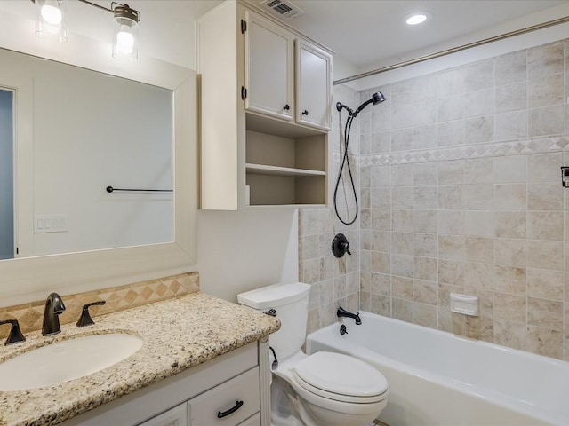 bathroom with visible vents, shower / bath combination, decorative backsplash, toilet, and vanity