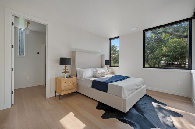 bedroom featuring light wood-type flooring