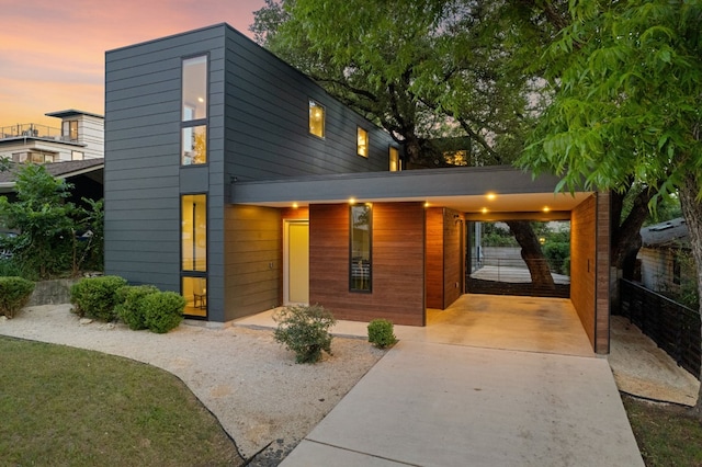 contemporary home with a carport