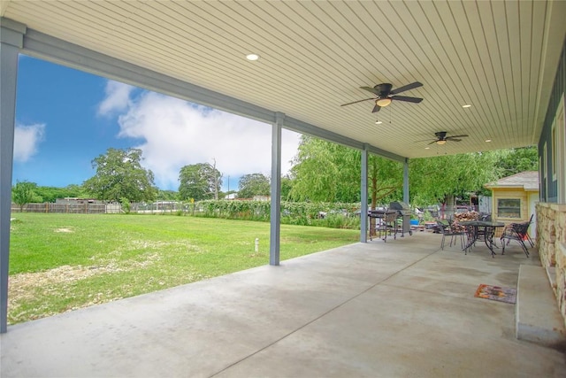 view of patio with ceiling fan