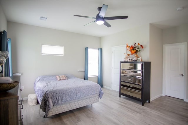 bedroom featuring light hardwood / wood-style floors and ceiling fan