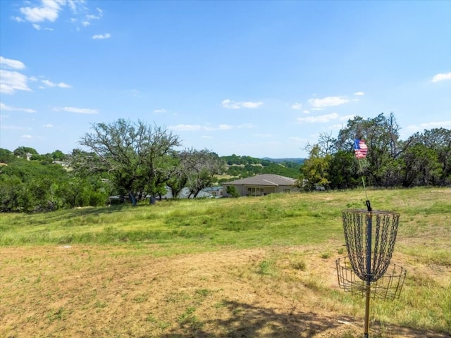 view of yard with a rural view