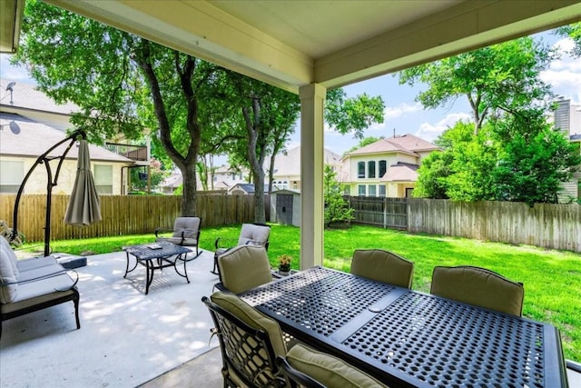 view of patio featuring a shed