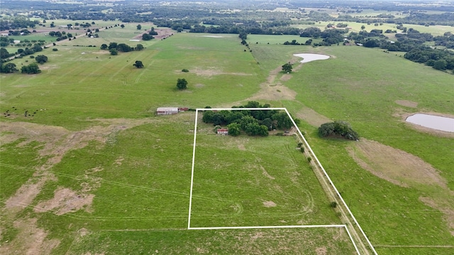 birds eye view of property featuring a rural view