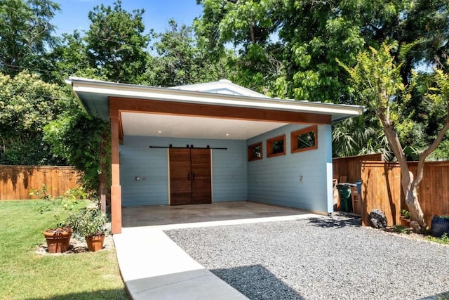 garage featuring a carport