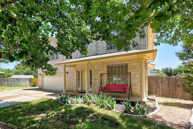 view of front of property with a garage