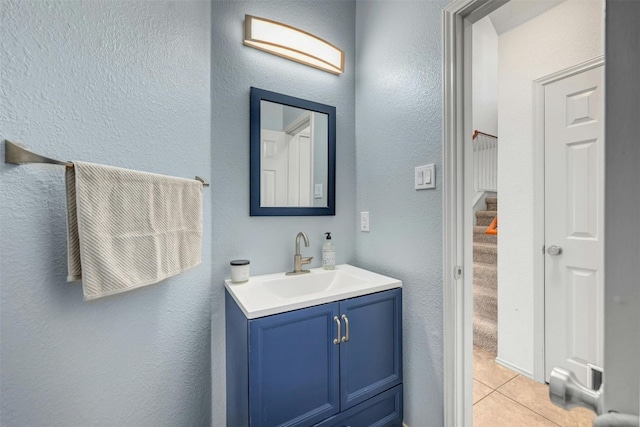 bathroom with vanity and tile patterned floors