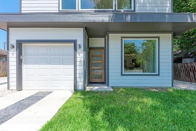 view of exterior entry featuring a garage