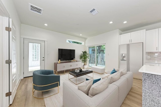 living room featuring light wood-type flooring