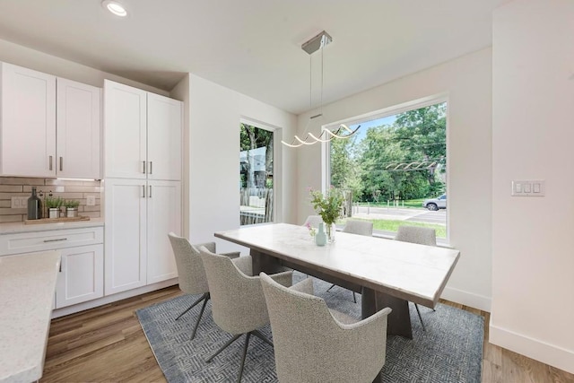 dining room with light hardwood / wood-style flooring