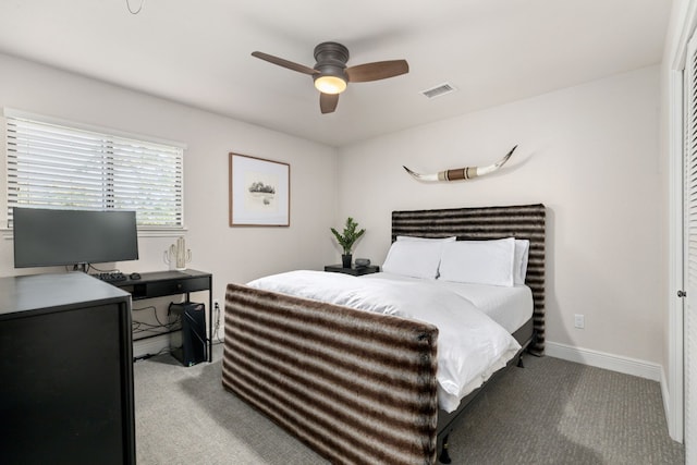 carpeted bedroom featuring ceiling fan