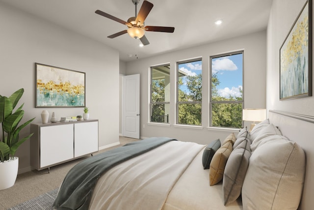 bedroom featuring light carpet and ceiling fan